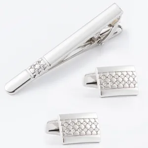 Silver tone metal tie clip and cufflinks set with sparkling rhinestones for men formal wear.