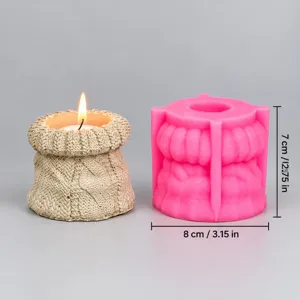 Detail view of knitted texture silicone candle mold with clear size dimensions 8x7 cm