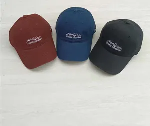 Detailed closeup of casual embroidered baseball caps in three colors for couple daily wear.