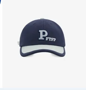 Close-up detail of the contrast color baseball cap with embroidered letter P and FTFP design.