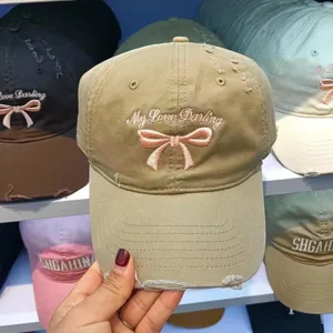 Korean sweet bow embroidered washed cotton baseball cap, trendy distressed dad hat for women.