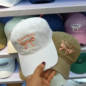 Korean sweet bow baseball cap detail, cotton fabric with cute embroidered ribbon and letter design.