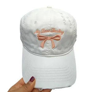 Women's white baseball cap with cute pink embroidered bow and sweet style design for daily casual wear.