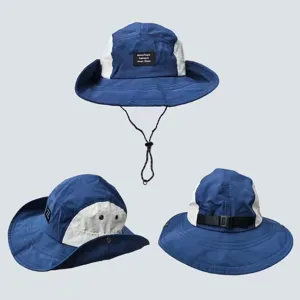 Breathable quick-drying color-block bucket hat for outdoor summer beach sun protection.
