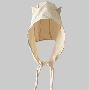 Y2K devil horn bonnet hat for women, cute tie-up headscarf cap with unique style and design.