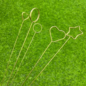 Gold metal floral card holders set, assorted geometric shapes for floral arrangement.