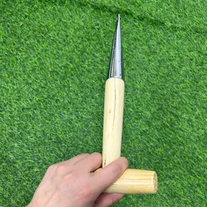 T-shaped wooden handle garden dibber tool with metal tip for planting seeding and transplanting.
