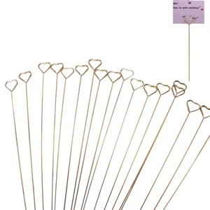 Gold heart metal floral card holders detail shot showing multiple sticks and usage.