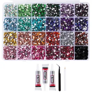 Colorful flatback resin rhinestones set with storage box, glue and tools for DIY nail art.