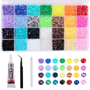 Detailed view of the multi-grid rhinestone set with assorted colors, glue, and DIY tools.