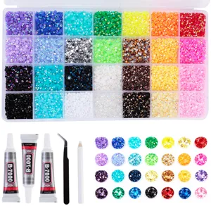 Flatback resin rhinestones set with storage box, glue and tools for DIY nail art crafts.