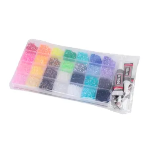 Multi-grid rhinestone set with colorful crystals, B-7000 glue and tools for DIY nail art.