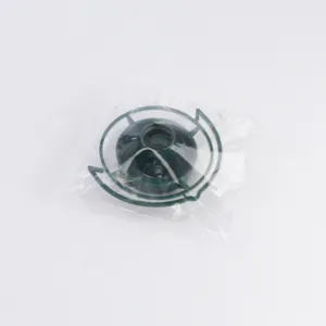 Plastic bottle top bird feeder accessory detail view, green hanging garden supply.