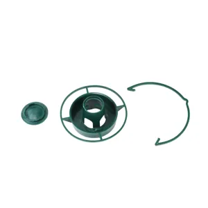 Plastic bottle top bird feeder parts detail view, green replacement components for garden.