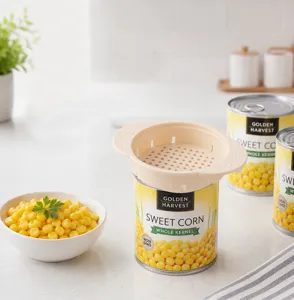 Plastic can strainer with dual handles, perfect for easily draining canned corn, tuna, and beans.