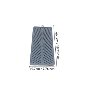 Silicone dish drying mat for kitchen counter, flexible heat resistant draining pad with hanging hole.