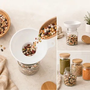 Wide mouth funnel for kitchen use with glass jars and wooden spoons for easy food storage.
