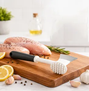 Meat mallet tenderizer tool with dual-sided hammer and axe blade for steak kitchen cooking.