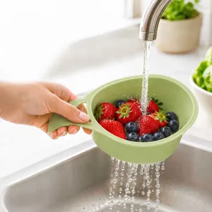 Creative mini plastic draining basket with handle for washing fruits and kitchen vegetables.
