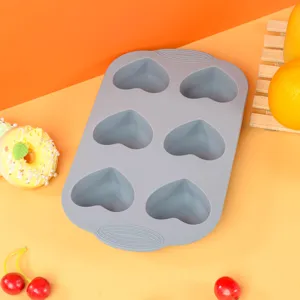 Gray 6-cavity heart silicone baking mold for delicious chocolate, cake, and pudding making.