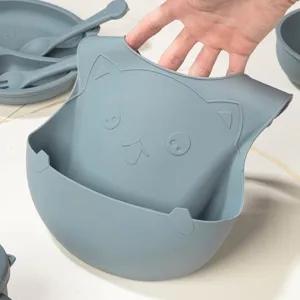 Silicone baby bib waterproof food catcher cute cat design soft infant feeding apron grey color