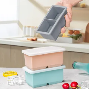 Silicone ice cube mold with lid, 2-compartment square ice tray for home kitchen use, easy release.