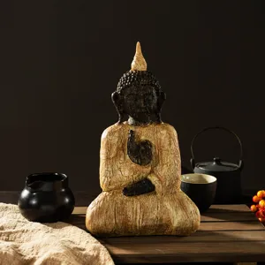 Exquisite resin buddha ornament detail, vintage wood texture zen decor for home and tea room.