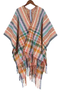 Bohemian fringe poncho for women, ethnic style colorful woven shawl for autumn and winter.