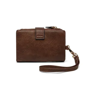 Portefeuille court en cuir marron, porte-monnaie compact avec dragonne et fentes pour cartes.