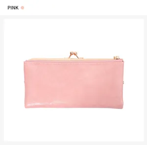 Pink vintage kiss-lock long wallet for women, multi-card slot minimalist clutch bag.