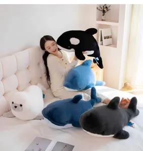 Detailed view of cute marine plush toys, featuring soft stuffed orca, dolphin, and seal dolls.