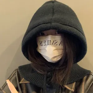 Korean style black knitted balaclava hood and scarf all-in-one for winter warmth.