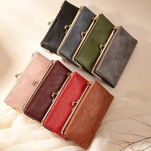 Vintage kiss lock long wallet for women, multiple card slots clutch purse, elegant design.