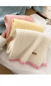 Cozy knitted winter scarf for women, thick warm wool neck warmer in multiple vibrant colors.