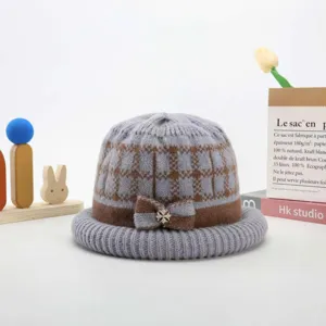 Women thick knit wool basin hat winter warm plaid cap with crystal bow decoration.