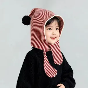 Kids winter warm knitted hat red white striped beanie with earflaps and cute pompom.