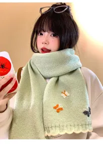 Cozy light green knitted scarf featuring cute embroidered butterflies, soft winter warm wool wrap.