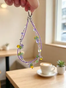 Handmade beaded double chain phone charm with colorful glass mushrooms for bag accessory.