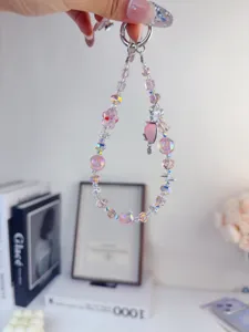 INS style pink crystal beaded phone strap with cute strawberry charm and metal ring.
