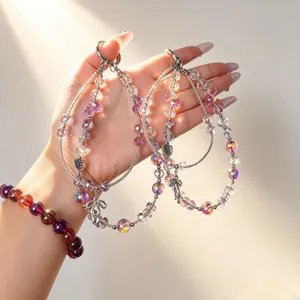 Doppelte Kristall HandyKette mit Schleife und bunten Perlen für Taschen und Schlüssel.