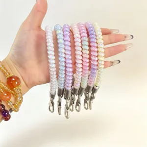 Colorful TPU telephone cord wrist phone lanyard detail, durable anti-lost strap design.