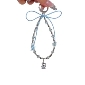 Cute blue bow beaded phone charm strap with crystal beads and little bear pendant for bags.