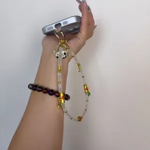 Cute Chinese style panda phone charm with bamboo beads, creative short wrist strap and bag pendant.