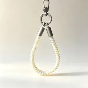 Detailed close-up of colorful TPU telephone cord wrist lanyard featuring durable metal clasps.