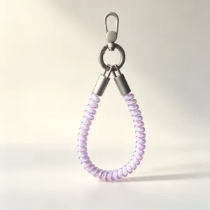 Detail view of the colorful TPU telephone wire wrist lanyard for phone case, sturdy design.