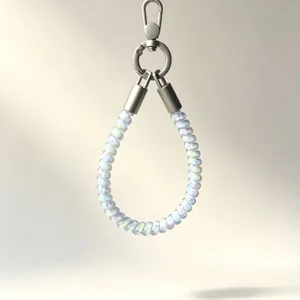 Colorful TPU telephone wire phone wrist strap detail showing flexible coiled design and metal clasp.