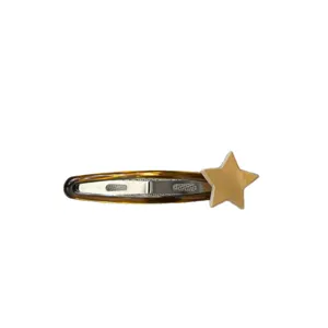 Chic tortoise shell snap hair clip with gold star accent, trendy Korean style bangs hairpin.