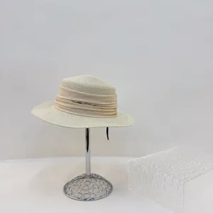 Women's beige straw hat, summer beach sun protection flat-top French fedora with metal accent.