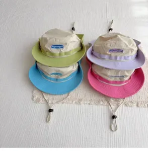 Outdoor sun protection quick-dry bucket hat detail, contrast color design with adjustable cord.