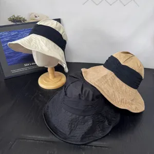Japanese style linen wide brim sun hat with stylish black ribbon detail, casual beach hat.
